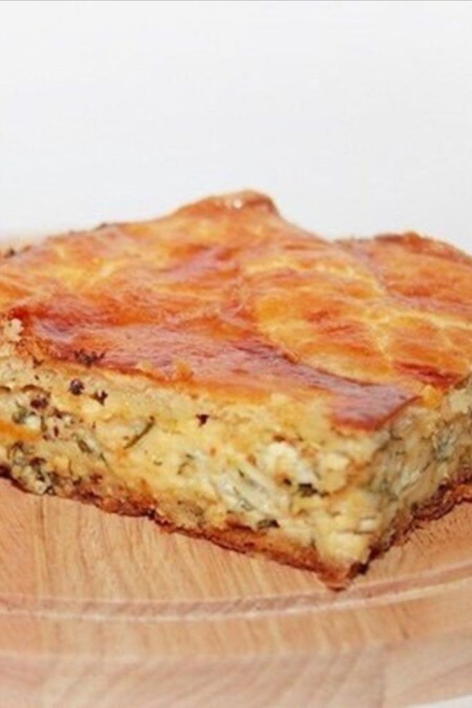 Закусочный пирог с сырками и луком. Помню мама пекла такой пирог даже на праздники, пользовался спросом